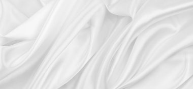 Dalgalı beyaz ipek kumaş dokusu.