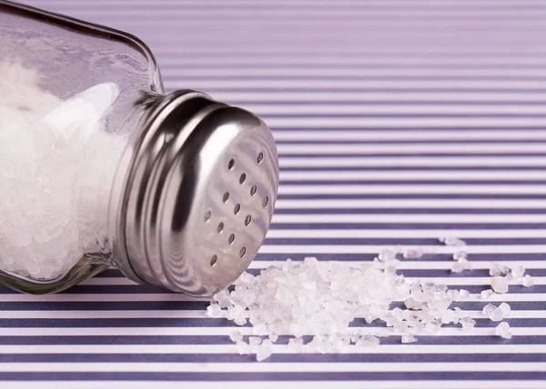 Bunch Salt Salt Shaker Lying Its Side Salt Kitchen — Stockfoto