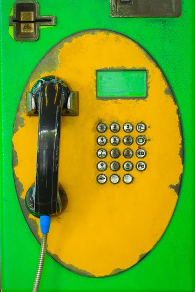 Ročník mince telefon — Stock fotografie