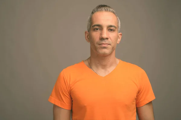 Studio Shot Handsome Persian Man Gray Hair Wearing Orange Shirt — Stock Photo, Image