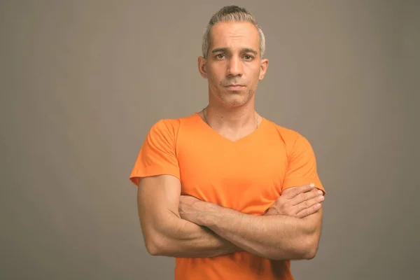 Studio Shot Handsome Persian Man Gray Hair Wearing Orange Shirt — Stock Photo, Image