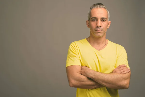 Studio Shot Handsome Persian Man Gray Hair Wearing Yellow Shirt — Stock Photo, Image