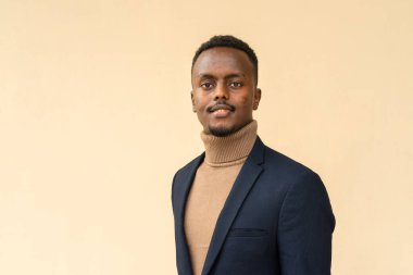 Portrait of young successful black businessman