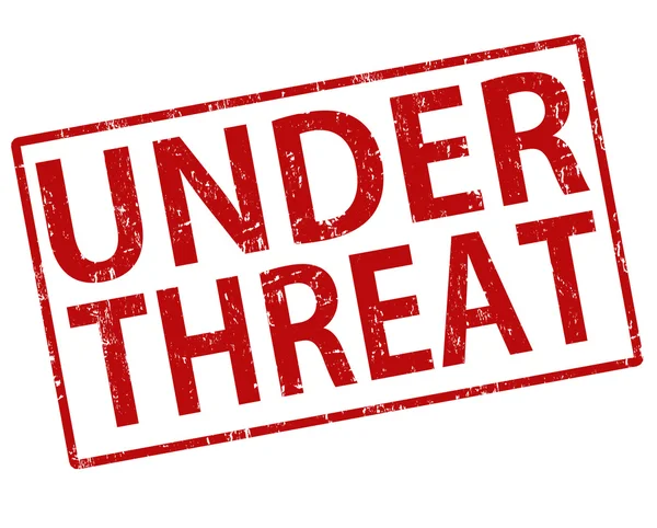 Under threat stamp — Stock Vector