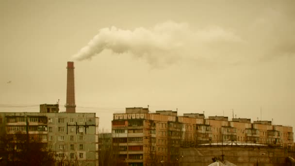 Factory pipe steams in the city. — Stock Video