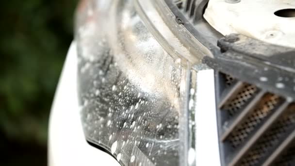 Man washing a car. Car at the car wash cleaned to a shine. — Stock Video