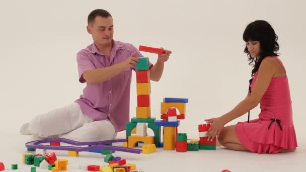 adults building toys