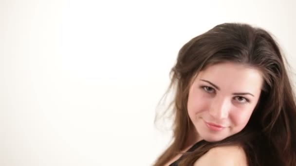 Cute young lady posing over white background — Stock Video