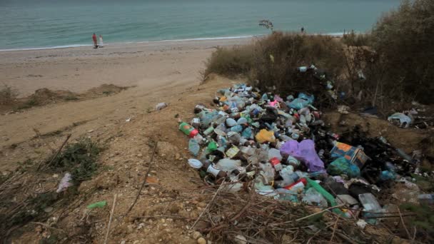 Nasty pile of a garbage in open nature. Pollution — Stock Video