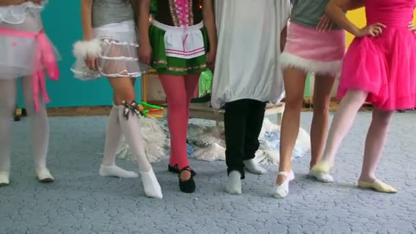 Beautiful girls show off their legs. — Stock Video