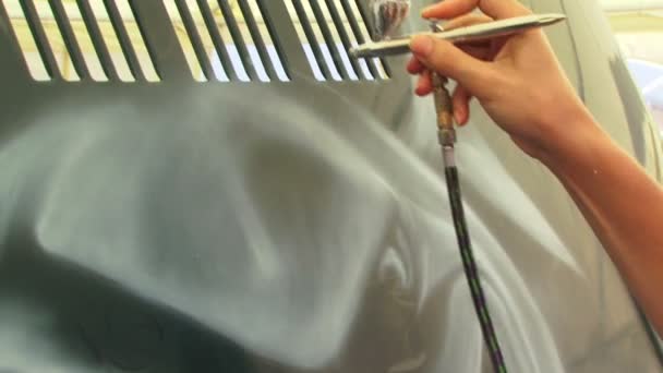 Painter painting with spray gun, airbrush car — Stock Video