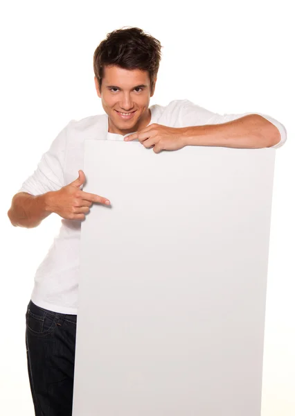 Man with empty poster to advertise the opening — Stock Photo, Image