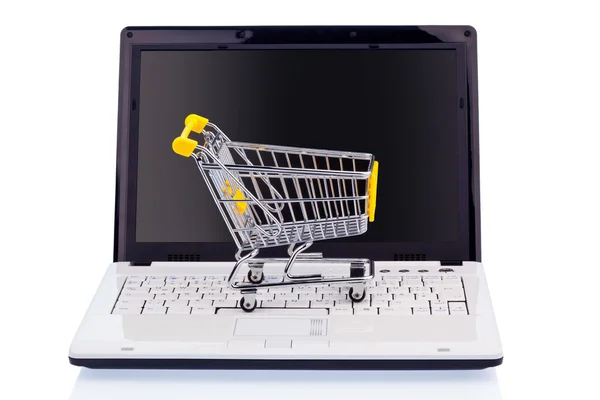 Cart and keyboard. online shopping — Stock Photo, Image