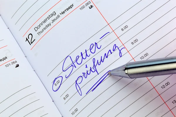 Entry in the calendar: tax audit — Stock Photo, Image