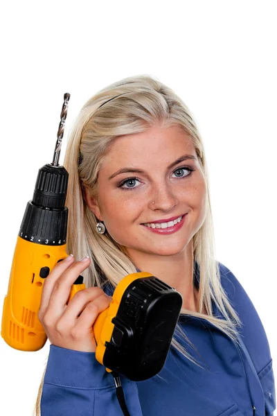 Frau in blauer Arbeitskleidung mit Bohrmaschine — Stockfoto