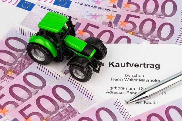 Purchase contract for new tractor — Stock Photo, Image