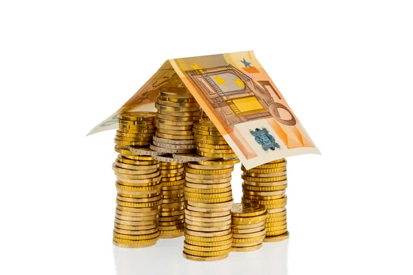 Huis van euro munten geld — Stockfoto