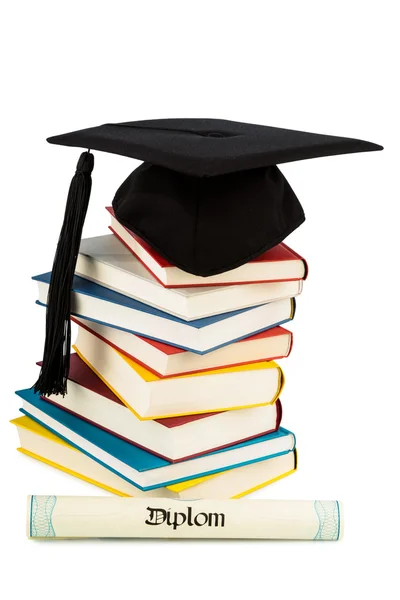 Mortarboard on books stack — Stock Photo, Image