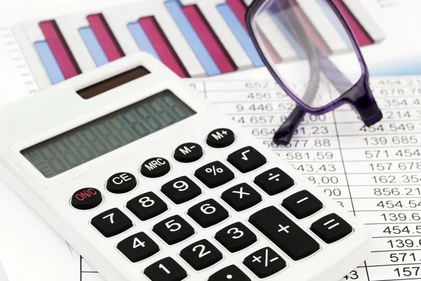 Calculator and figures — Stock Photo, Image