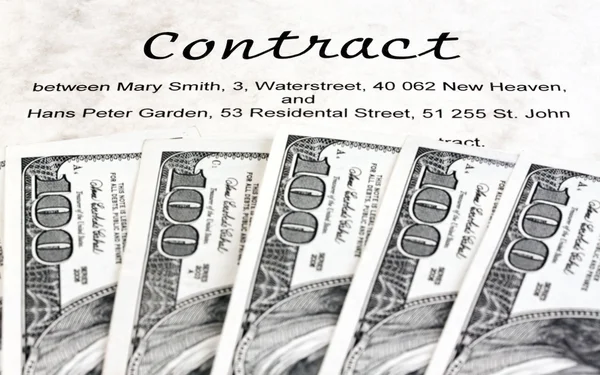 Dollar currency notes and english contract — Stock Photo, Image