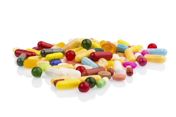 Mnoho barevných pilulek — Stock fotografie