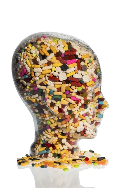 Head made of glass with tablets — Stock Photo, Image