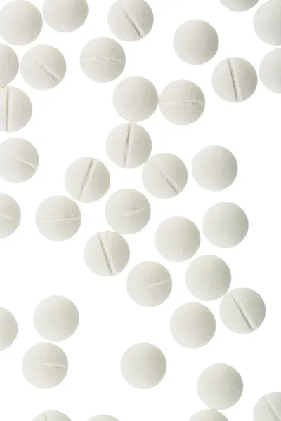 Białe tabletki — Zdjęcie stockowe