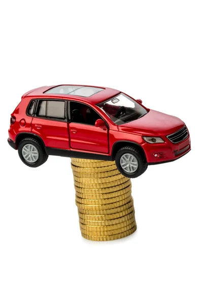 Rising car costs. car on coins — Stock Photo, Image