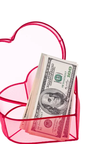 Bons du dollar américain dans un coeur — Photo