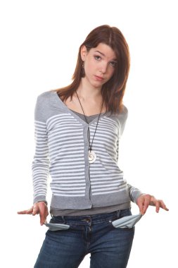 Broke, young woman shows her empty pockets clipart