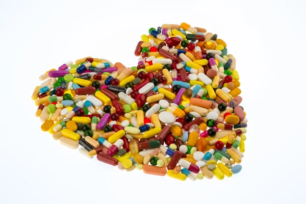 Coloridas pastillas en forma de corazón —  Fotos de Stock