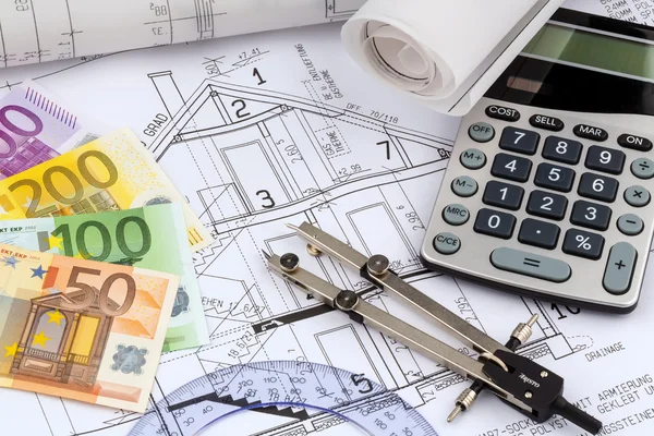 Plan van het huis met calculator — Stockfoto