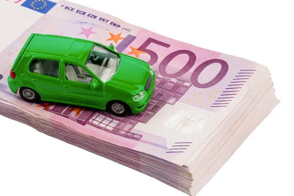 Groene auto op bankbiljetten — Stockfoto