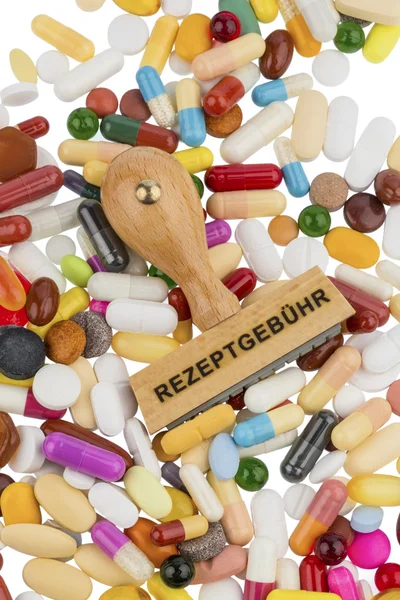 Stämpel på färgglada tabletter — Stockfoto