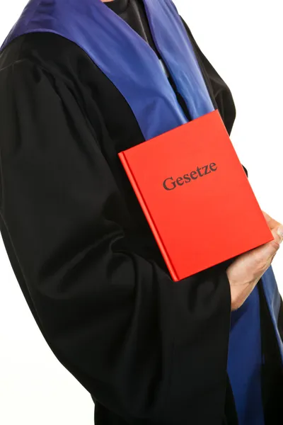 Juez en el tribunal con un libro de estatutos — Foto de Stock