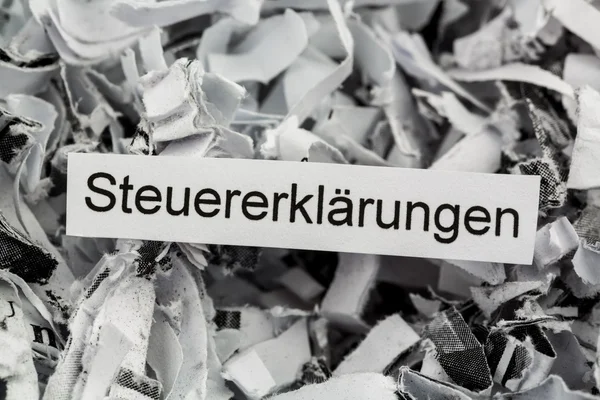 Shredded paper tax returns — Stock Photo, Image