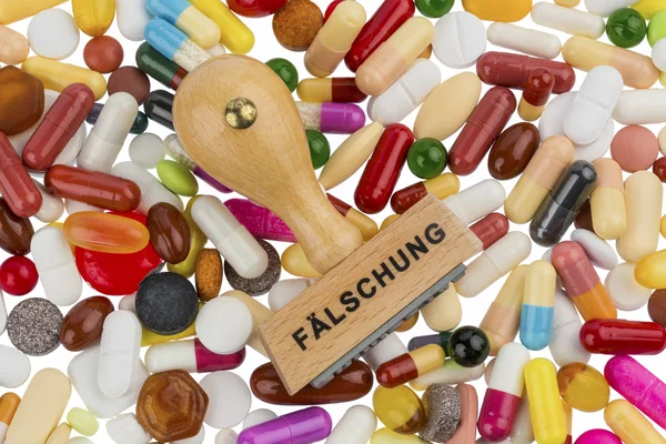 Stämpel på färgglada tabletter — Stockfoto