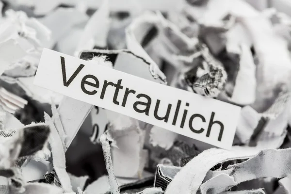 Geschreddertes Papier Stichwort vertraulich — Stockfoto