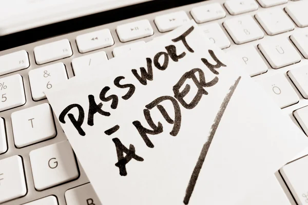 Note on computer keyboard: change password — Stock Photo, Image