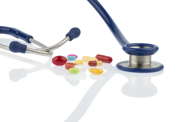 Colorful tablets a stethoscope — Stock Photo, Image