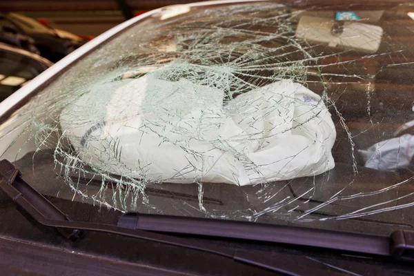 Broken windshield and airbag — Stock Photo, Image