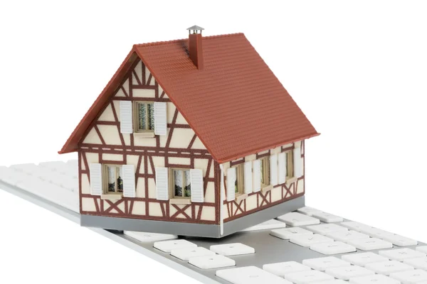 Haus auf Tastatur — Stockfoto