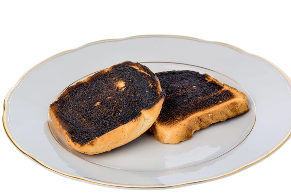 Burned toast bread slices — Stock Photo, Image