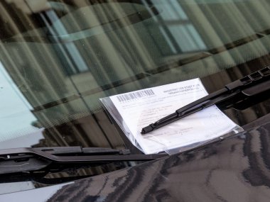 Speeding ticket on car clipart