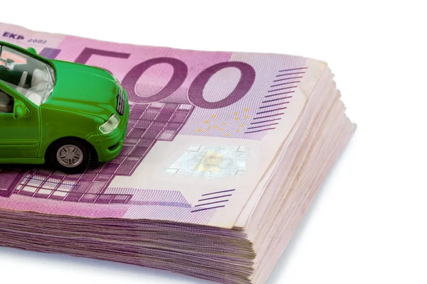 Groene auto op bankbiljetten — Stockfoto