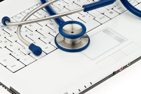 Stethoscope on laptop. — Stock Photo, Image