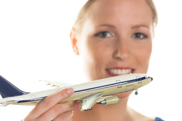 Mujer con modelo de avión — Foto de Stock