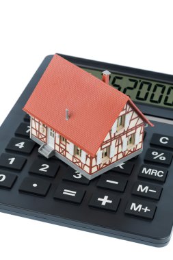 Residential house on calculator clipart