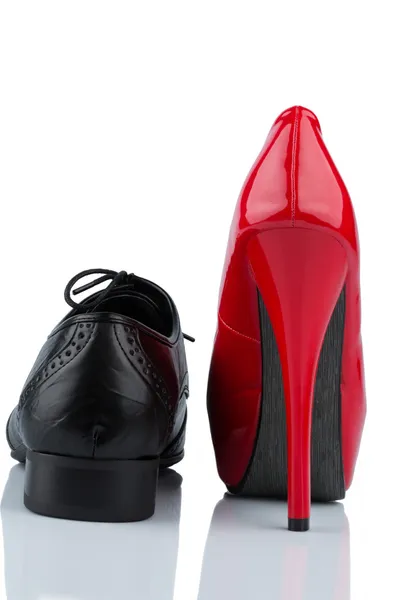 High heels and men's shoe — Stock Photo, Image