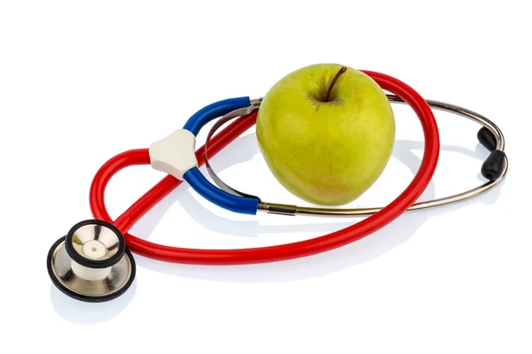 Apfel und Stethoskop — Stockfoto